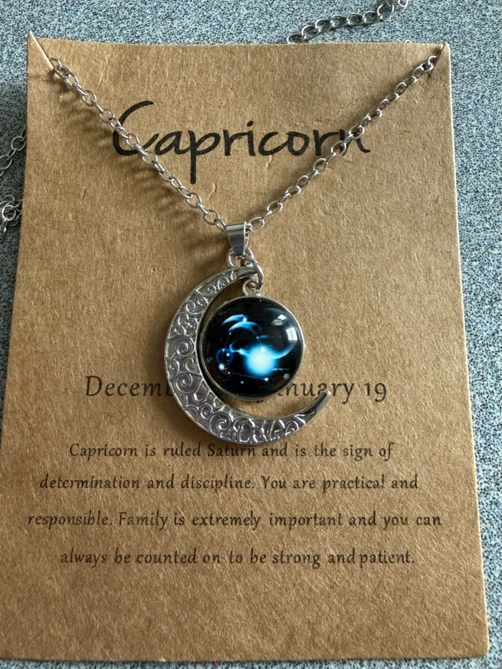 Capricorn Silver Moon Necklace with Blue Orb